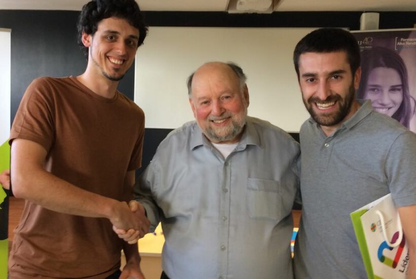 a group of men shaking hands